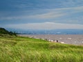 Park Point Beach on Lake Superior with Duluth, Minnesota under cloudy skies