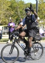 A park policeman on bike patrol