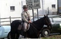 Police officer on horseback next to a road in Bladensburg, Md