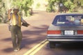 A park ranger directing motorists,