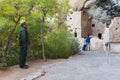 Park Ranger looking at mother and son visiting Cliff Palace in Mesa Verde National Park