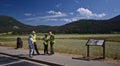 Park rangers helping tourists Royalty Free Stock Photo