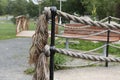 A rope with black pole in a park