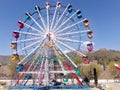 Park round hanging flying chairs for children Royalty Free Stock Photo