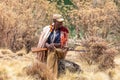 Park scout with rifle in Simien Mountain, Ethiopia Royalty Free Stock Photo