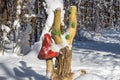 Park sculpture of the toadstool in the winter forest Royalty Free Stock Photo