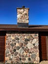 Stone chimney and wall on park shelter Royalty Free Stock Photo