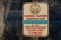 Park sign warning hikers about mountain lions