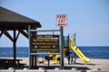 Keep it Clean and Park exit Signs at Sodus Point Bay Royalty Free Stock Photo