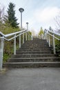 Park staircase with metal rails leading up to sky Royalty Free Stock Photo
