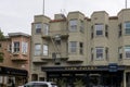 The Park Tavern and the Washington Square Inn with cars parked along the street at Washington Square in San Francisco California Royalty Free Stock Photo