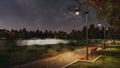 Park walkway lit by street lamps at autumn night Royalty Free Stock Photo