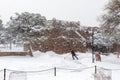 Park worker clears snow during a winter storm in Grand Canyon National Park