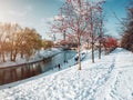 Park in Yekaterinburg city along the Iset river at winter time at sunny day with people walking Royalty Free Stock Photo