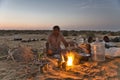 Parkash, the camel keeper from the Thar Desert Great Indian Desert in Rajasthan, is preparing dinner.