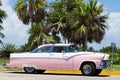 Parked american classic car on the street in Santa Clara Cuba