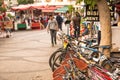 parked bicycles bikes for rent on sidewalk