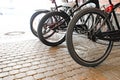 Parked Bicycles On Sidewalk. Bike Bicycle Parking On The Street