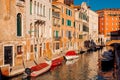Parked boats, gondolas transport movement Grand Canal Venice, Italy.