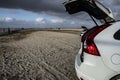 With a parked car and open trunk on the beach in Romo, Denmark Royalty Free Stock Photo