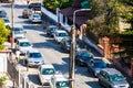 Parked cars along a cobblestone street in Alba Iulia, Romania, 2020