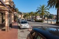 Parked cars along the street near the coastline of Mediterranean sea.