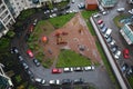 Parked cars in the courtyard of a block of flats in a new district of St. Petersburg. view from above Royalty Free Stock Photo