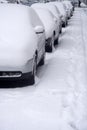 Parked cars in deep snow (room for text)