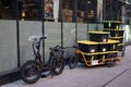 Parked Delivery Bike with Lots of Packages on the Sidewalk in Midtown Manhattan of New York City