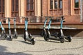 Parked e-scooters of the company OKAI in the city of Kolobrzeg in Poland are ready to be borrowed