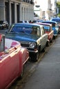 Parked old cars on Agramonte Street, ciose up. Old Havana Royalty Free Stock Photo