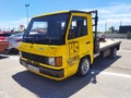 Parked old yellow Mercedes Benz MB100 truck