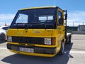Parked old yellow Mercedes Benz MB100 truck