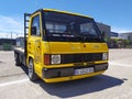 Parked old yellow Mercedes Benz MB100 truck