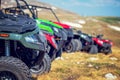 Parked in a row several atv quad bikes extreme outdoor adventure concept Royalty Free Stock Photo