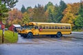 Parked school buses in New England. Foliage Season Royalty Free Stock Photo