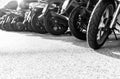 Parked small motorcycles in a row Royalty Free Stock Photo