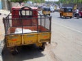 Parked truck at side of busy road