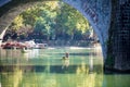 Parked wooden tourist boat on the Tuojiang River in Phoenix Ancient Town