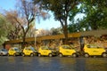 Parked yellow Share`ngo cars Royalty Free Stock Photo