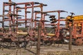 Parking agricultural machinery and harvest. rows of plows, cultivators, bodies
