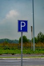 Parking allowed sign on cloudy sky background