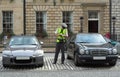 Parking attendant, traffic warden, getting ticket fine mandate