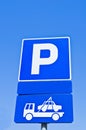 Parking blue sign against blue sky Royalty Free Stock Photo