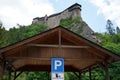 Parking booth made of wood with traffic sign for parking in area around Orava castle in Slovakia. Royalty Free Stock Photo