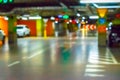 Parking car blurred. Empty road asphalt background in soft focus. Car lot parking space in underground city garage Royalty Free Stock Photo