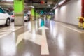 Parking car blurred. Empty road asphalt background in soft focus. Car lot parking space in underground city garage. Interior Royalty Free Stock Photo