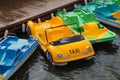 Parking of colorful water bicycles. Royalty Free Stock Photo
