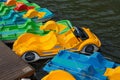 Parking of colorful water bicycles. Royalty Free Stock Photo