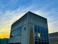 Parking deck elevator entrance and golden hour sun rise